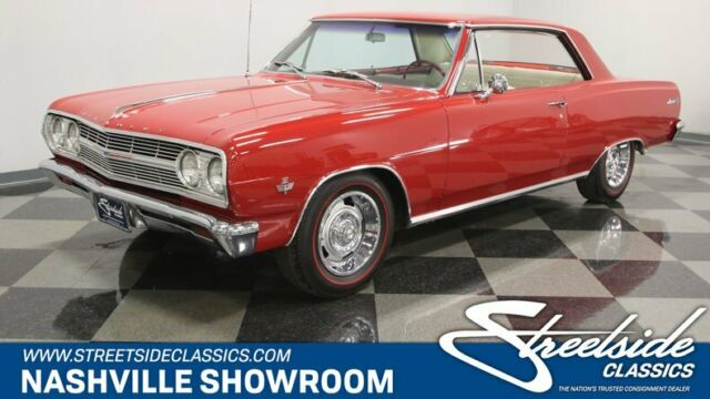 Red 1965 Chevrolet Chevelle Hardtop with White interior