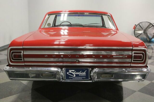 Red 1965 Chevrolet Chevelle Hardtop with White interior