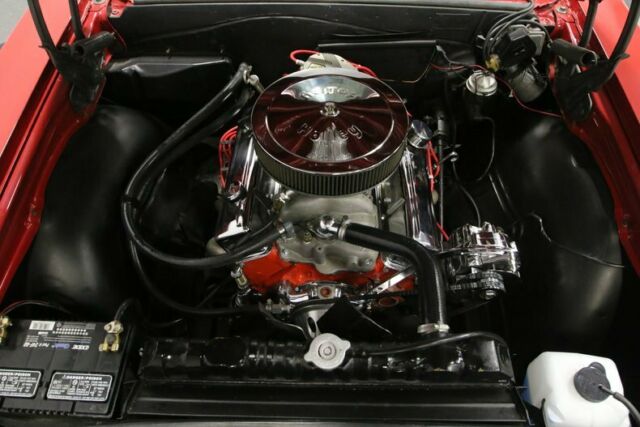 Red 1965 Chevrolet Chevelle Hardtop with White interior