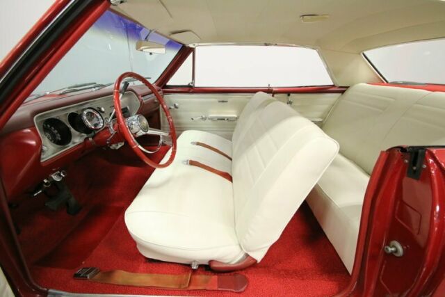 Red 1965 Chevrolet Chevelle Hardtop with White interior