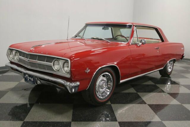 Red 1965 Chevrolet Chevelle Hardtop with White interior