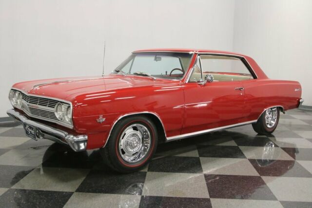 Red 1965 Chevrolet Chevelle Hardtop with White interior