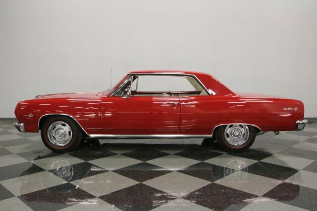 Red 1965 Chevrolet Chevelle Hardtop with White interior