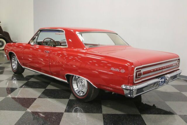 Red 1965 Chevrolet Chevelle Hardtop with White interior