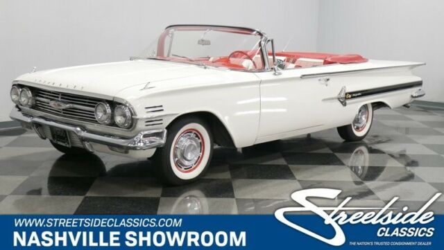 White 1960 Chevrolet Impala Convertible with Red interior