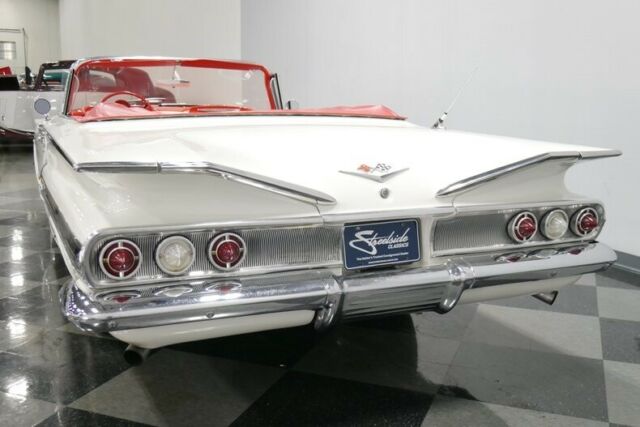 White 1960 Chevrolet Impala Convertible with Red interior