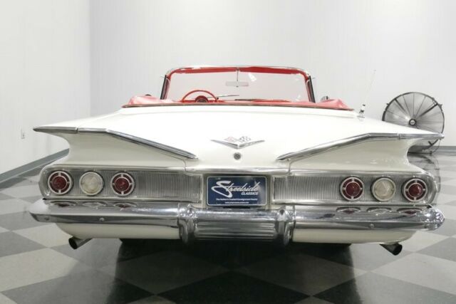 White 1960 Chevrolet Impala Convertible with Red interior