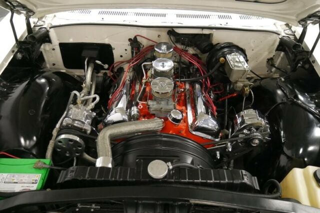 White 1960 Chevrolet Impala Convertible with Red interior