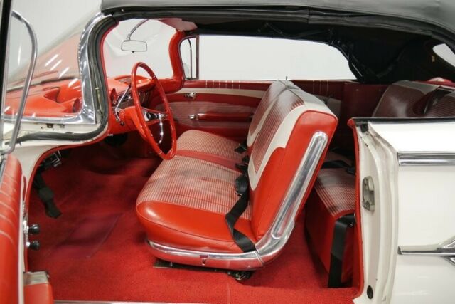 White 1960 Chevrolet Impala Convertible with Red interior