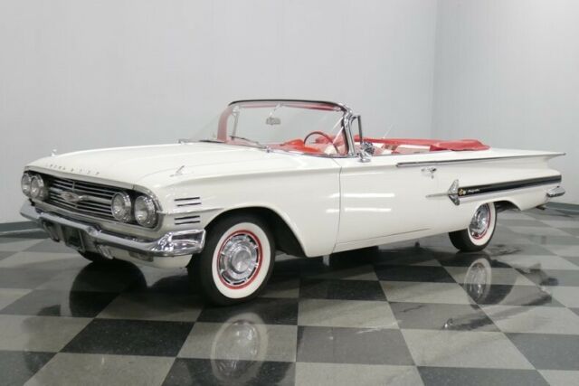White 1960 Chevrolet Impala Convertible with Red interior