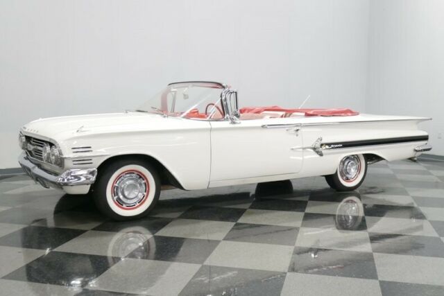 White 1960 Chevrolet Impala Convertible with Red interior