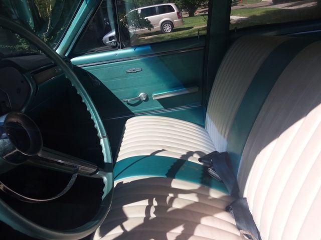 Green 1965 Chevrolet Chevelle Sedan with Teal interior