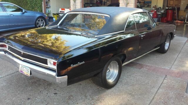 Black 1966 Chevrolet Chevelle Coupe with Black interior
