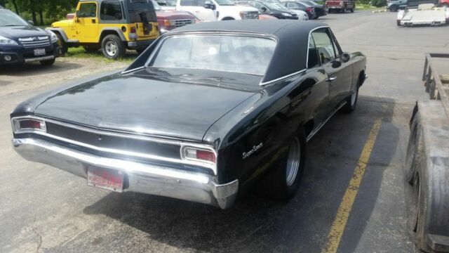 Black 1966 Chevrolet Chevelle Coupe with Black interior