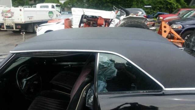 Black 1966 Chevrolet Chevelle Coupe with Black interior