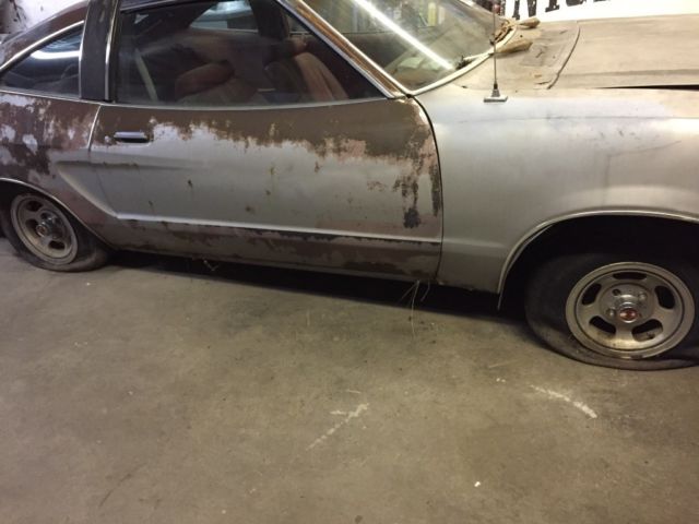 Silver 19780000 Ford Mustang Hatchback with Red interior