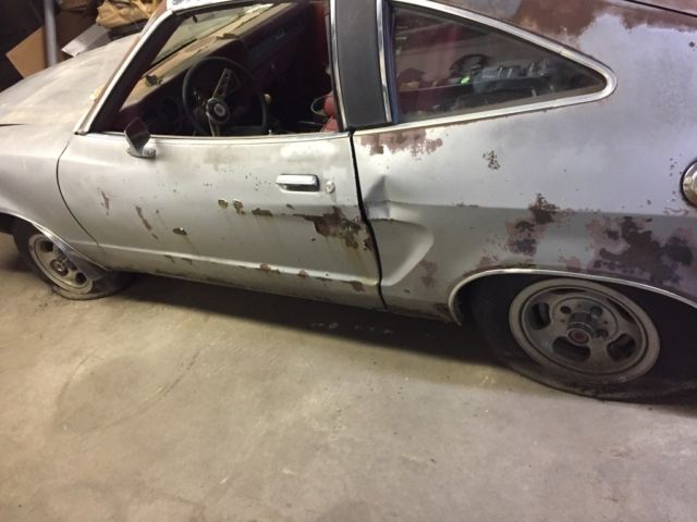 Silver 19780000 Ford Mustang Hatchback with Red interior