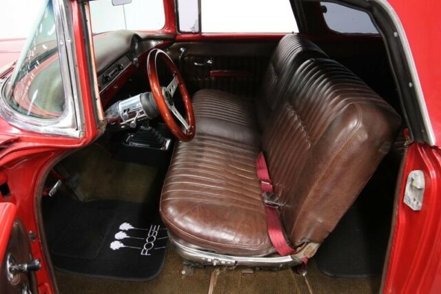 Red 1955 Chevrolet Nomad Station Wagon with Brown interior