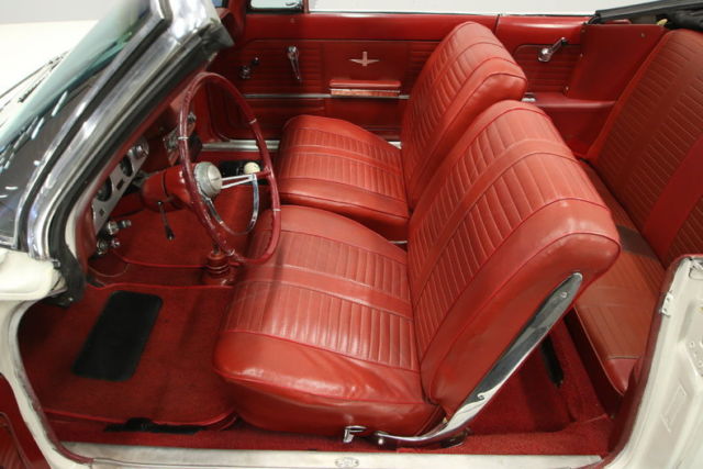 White 1964 Chevrolet Corvair Convertible with Red interior
